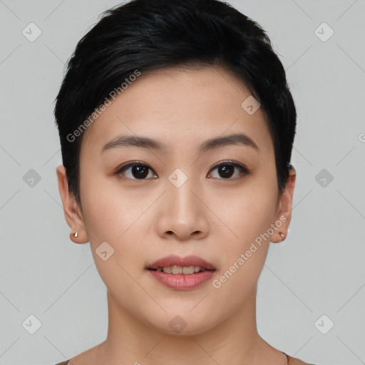 Joyful asian young-adult female with short  black hair and brown eyes