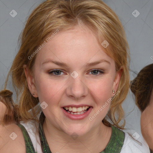 Joyful white young-adult female with medium  brown hair and blue eyes