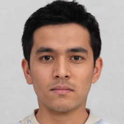 Neutral asian young-adult male with short  black hair and brown eyes