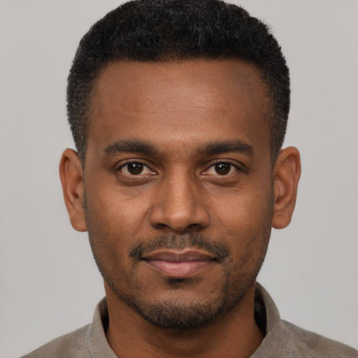 Neutral black young-adult male with short  black hair and brown eyes