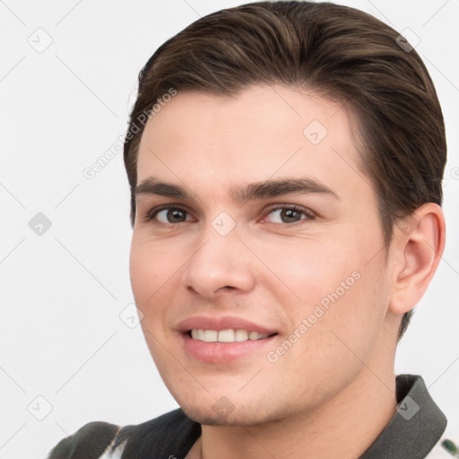 Joyful white young-adult male with short  brown hair and brown eyes