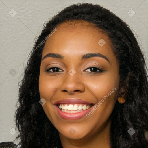 Joyful latino young-adult female with long  black hair and brown eyes