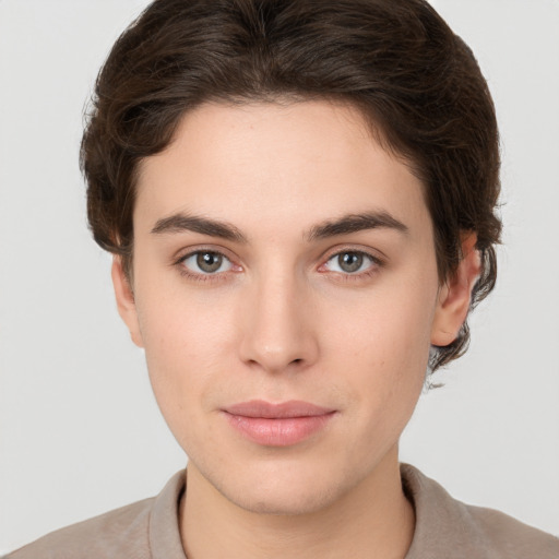 Neutral white young-adult female with short  brown hair and brown eyes