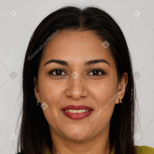 Joyful latino young-adult female with long  brown hair and brown eyes