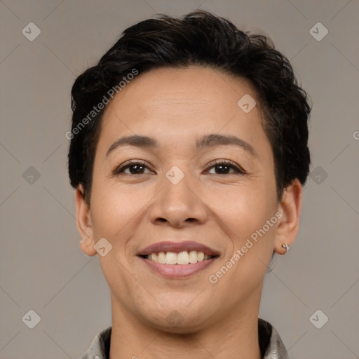 Joyful white adult female with short  brown hair and brown eyes