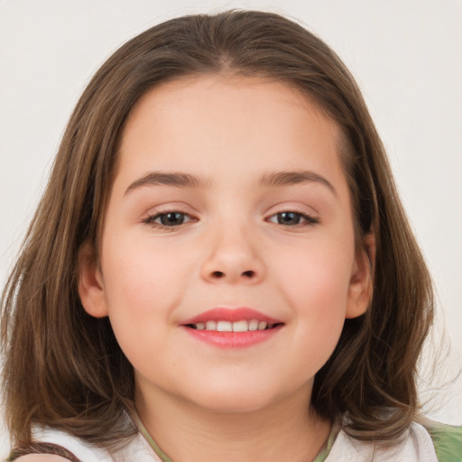 Joyful white child female with medium  brown hair and brown eyes