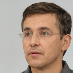 Neutral white adult male with short  brown hair and brown eyes