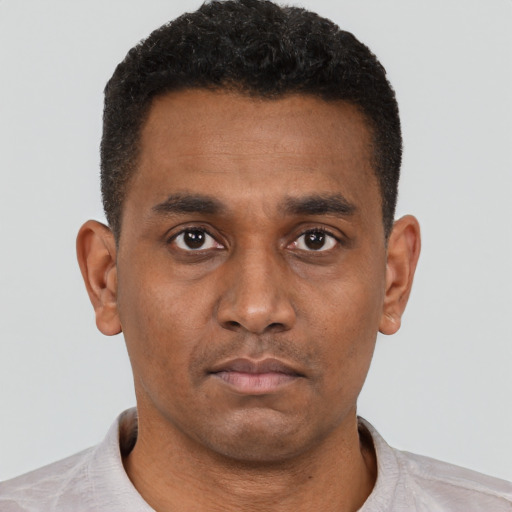 Neutral black young-adult male with short  brown hair and brown eyes