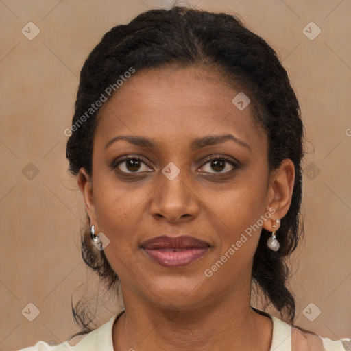Joyful black young-adult female with medium  brown hair and brown eyes