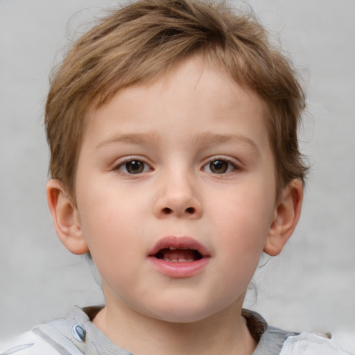 Neutral white child male with short  brown hair and blue eyes