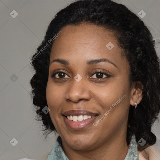 Joyful black young-adult female with medium  black hair and brown eyes