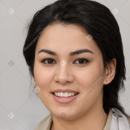 Joyful latino young-adult female with medium  brown hair and brown eyes