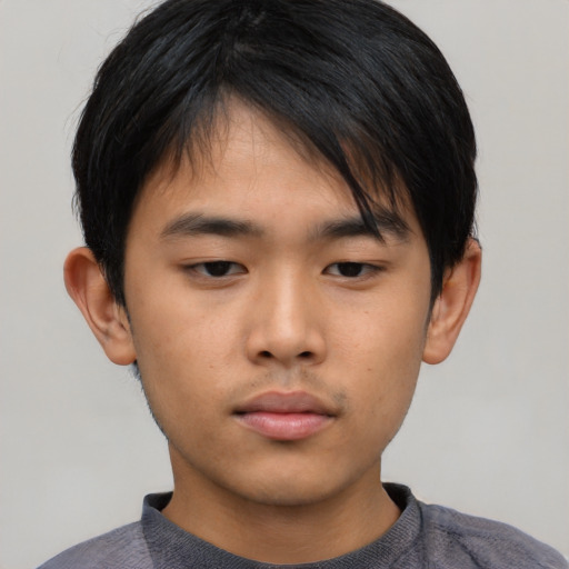 Neutral asian young-adult male with short  black hair and brown eyes
