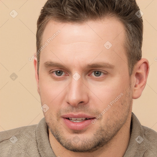 Joyful white young-adult male with short  brown hair and brown eyes