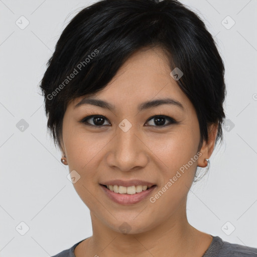 Joyful asian young-adult female with medium  black hair and brown eyes