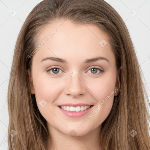 Joyful white young-adult female with long  brown hair and grey eyes