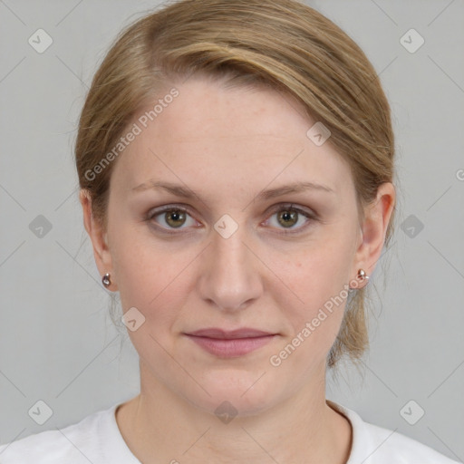 Joyful white young-adult female with medium  brown hair and blue eyes