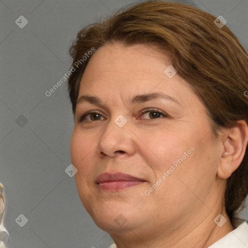 Joyful white adult female with short  brown hair and brown eyes