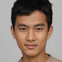 Neutral asian young-adult male with short  brown hair and brown eyes