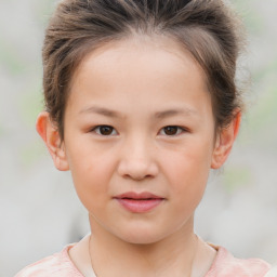 Joyful white child female with short  brown hair and brown eyes