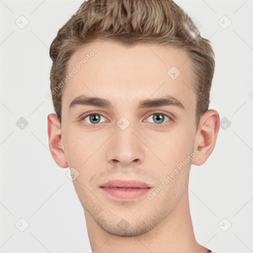 Joyful white young-adult male with short  brown hair and grey eyes