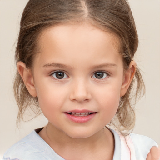 Joyful white child female with medium  brown hair and brown eyes