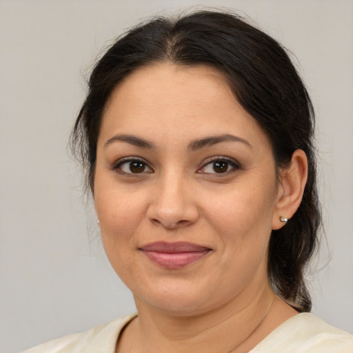 Joyful white young-adult female with medium  brown hair and brown eyes