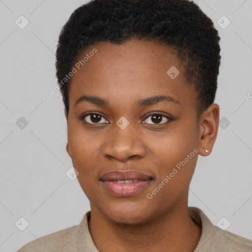 Joyful black young-adult female with short  black hair and brown eyes