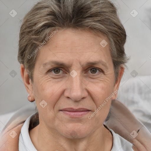 Joyful white adult female with short  brown hair and brown eyes