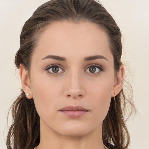 Neutral white young-adult female with medium  brown hair and brown eyes