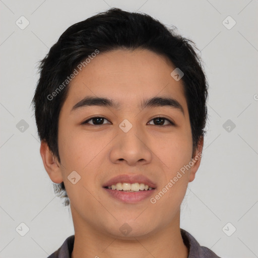 Joyful asian young-adult male with short  black hair and brown eyes