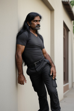 Sri lankan middle-aged male with  black hair