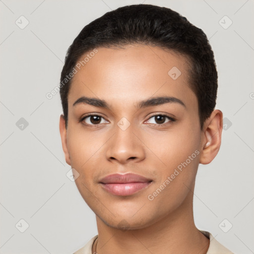 Joyful latino young-adult female with short  black hair and brown eyes