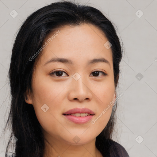 Joyful asian young-adult female with long  brown hair and brown eyes