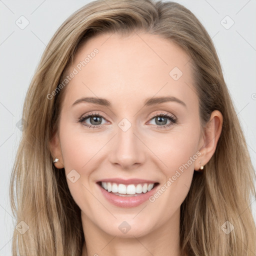 Joyful white young-adult female with long  brown hair and blue eyes