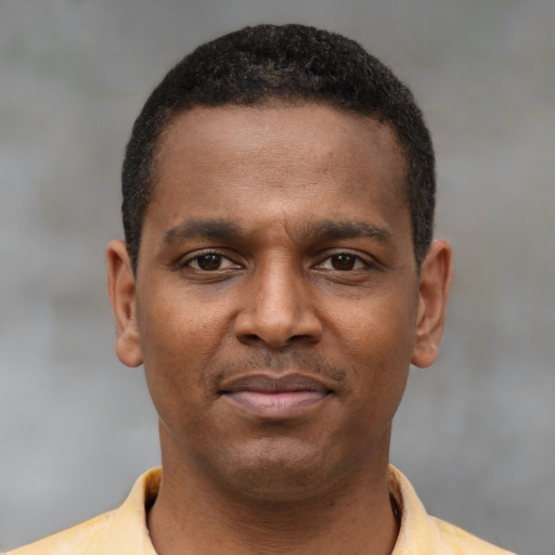 Neutral black young-adult male with short  brown hair and brown eyes