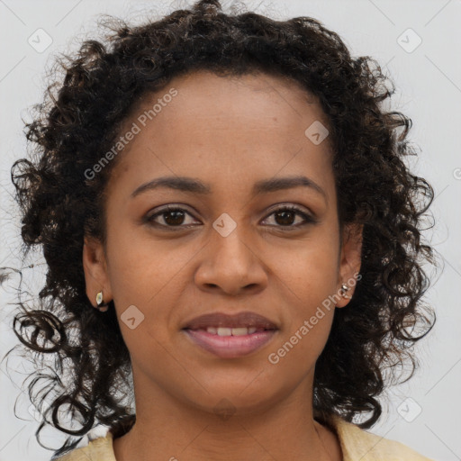 Joyful black young-adult female with medium  brown hair and brown eyes