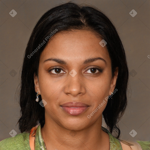 Joyful black young-adult female with medium  brown hair and brown eyes