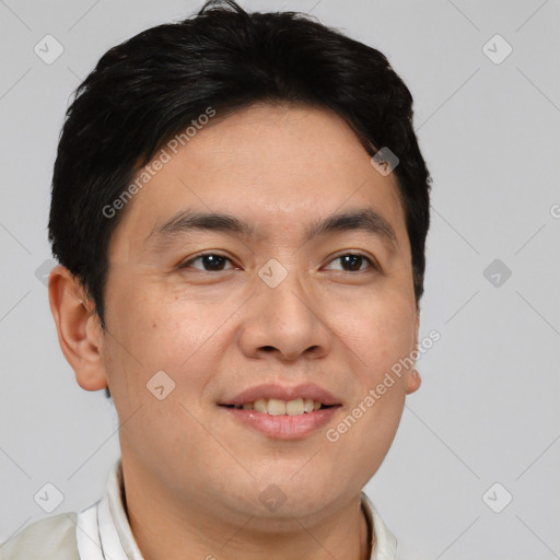 Joyful asian young-adult male with short  brown hair and brown eyes