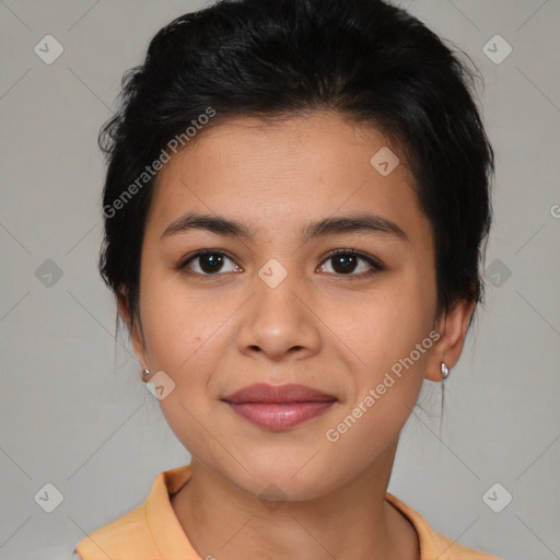 Joyful latino young-adult female with medium  brown hair and brown eyes