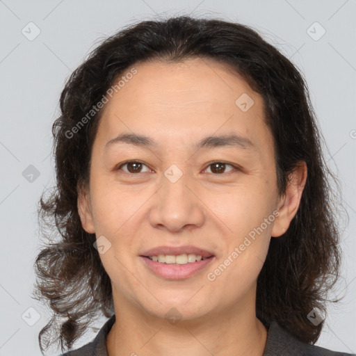 Joyful white adult female with medium  brown hair and brown eyes