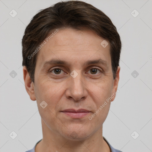 Joyful white adult male with short  brown hair and brown eyes