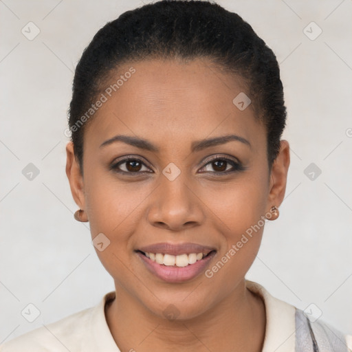 Joyful latino young-adult female with short  brown hair and brown eyes