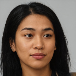 Neutral asian young-adult female with medium  brown hair and brown eyes