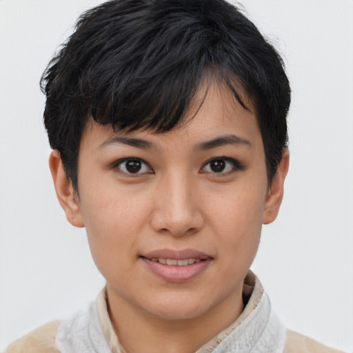 Joyful asian young-adult female with short  brown hair and brown eyes