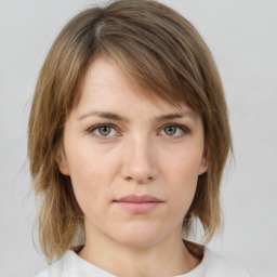 Neutral white young-adult female with medium  brown hair and grey eyes