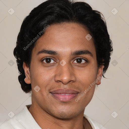 Joyful latino young-adult male with short  brown hair and brown eyes