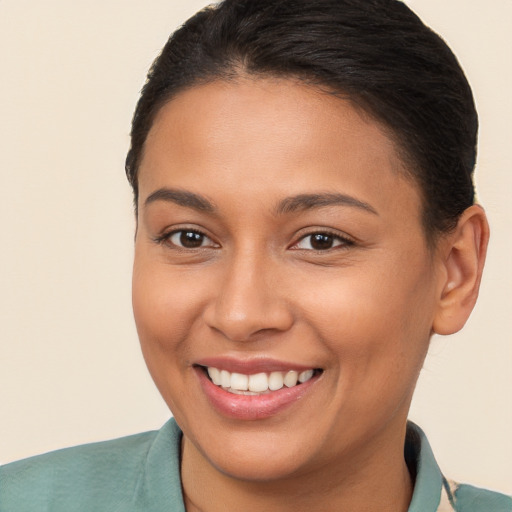 Joyful white young-adult female with short  brown hair and brown eyes