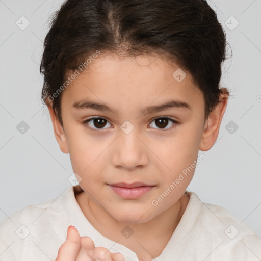 Joyful white child female with short  brown hair and brown eyes