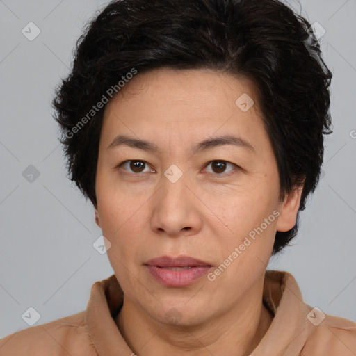 Joyful white adult female with short  brown hair and brown eyes